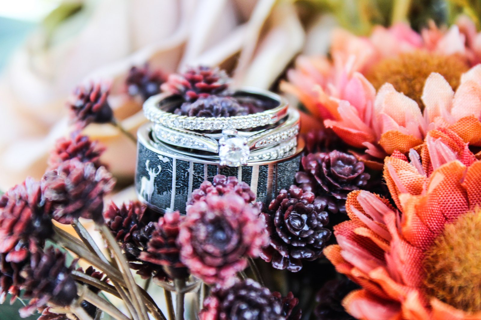 Wedding rings resting on a bouquet